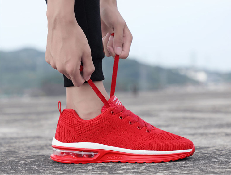 Zapatillas de tenis de plataforma de cojín de aire transpirable populares para hombre y mujer