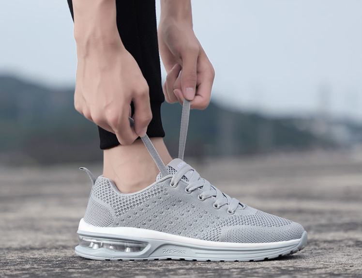 Zapatillas de tenis de plataforma de cojín de aire transpirable populares para hombre y mujer