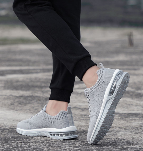 Zapatillas de tenis de plataforma de cojín de aire transpirable populares para hombre y mujer
