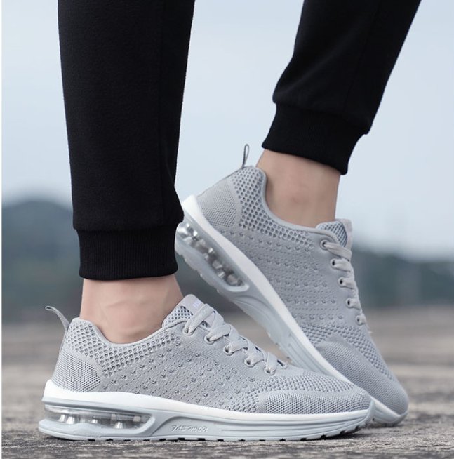 Zapatillas de tenis de plataforma de cojín de aire transpirable populares para hombre y mujer