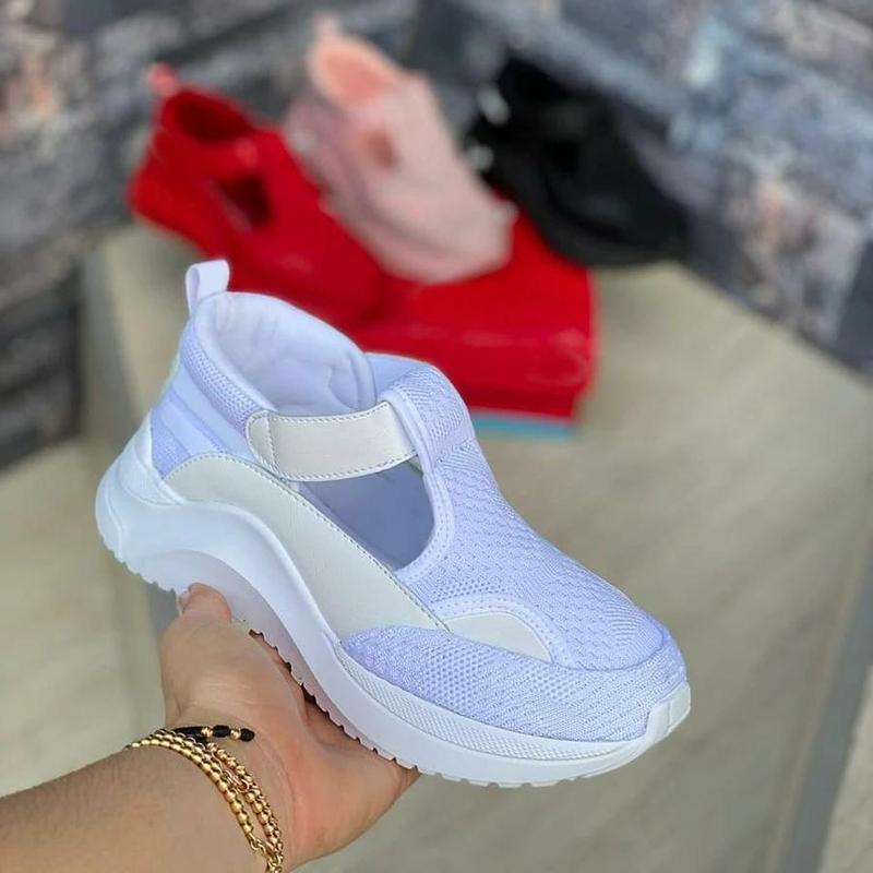 Zapatillas de deporte con colchón de aire tejido volador casual para mujer