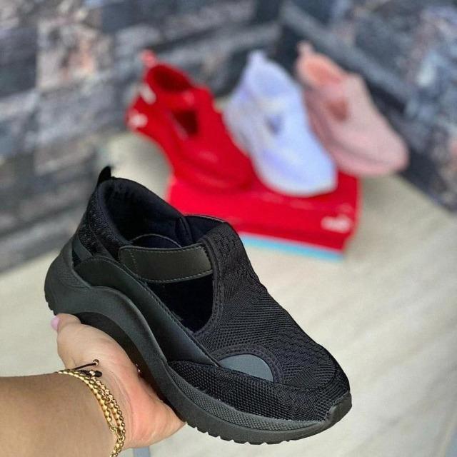 Zapatillas de deporte con colchón de aire tejido volador casual para mujer