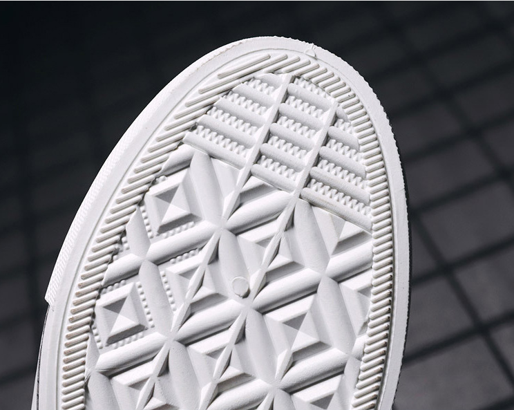 Zapatos de lonas rotas para hombre y mujer