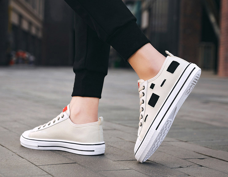 Zapatos de lonas rotas para hombre y mujer